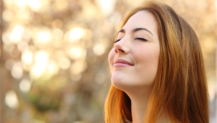 woman breathing fresh air