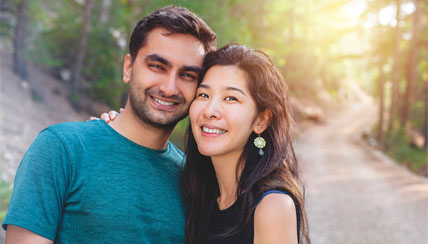 Happy couple on a nature trail