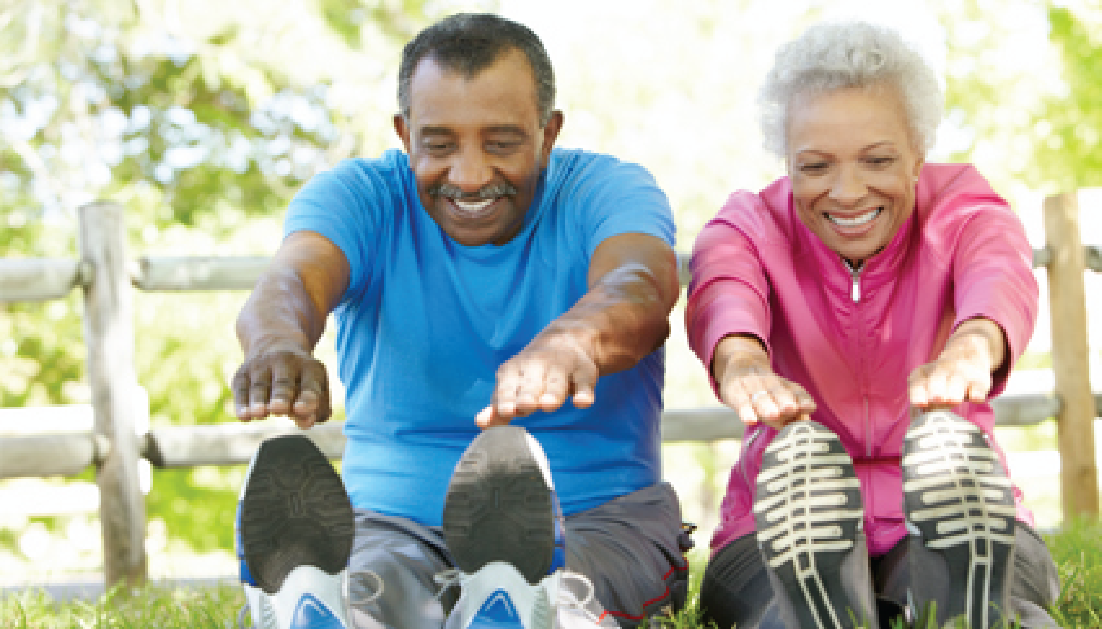 Two seniors stretching