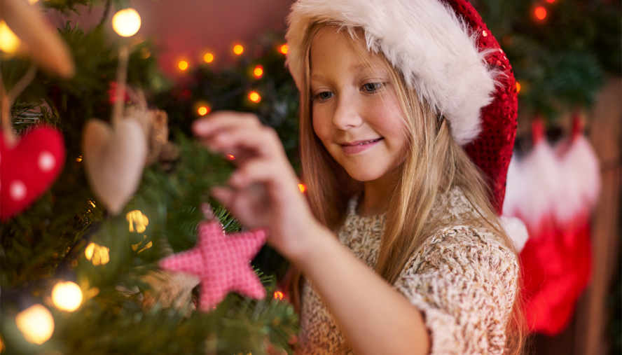 child celebrating christmas