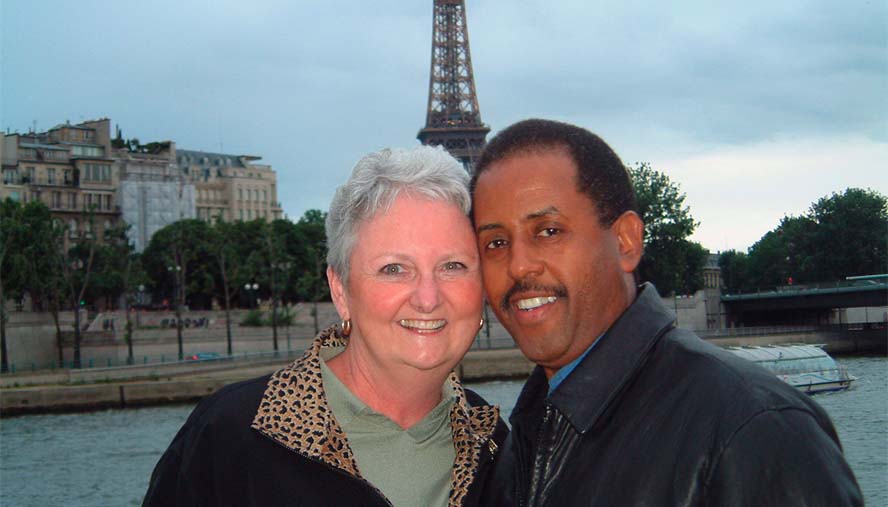 Roger Gibson smiling with his wife