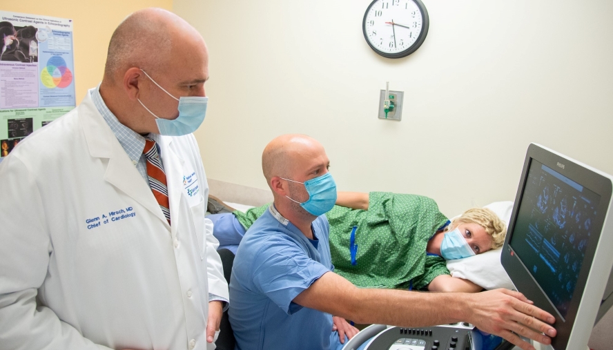 two physicians reviewing health records