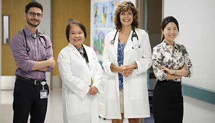 Asthma Doctors standing in hallway