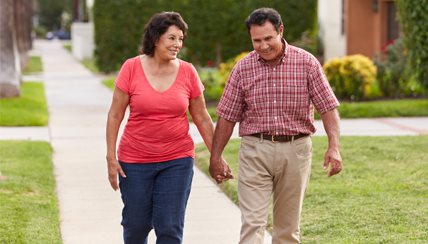 Couple walking holding hands