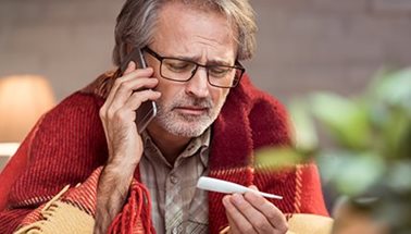 man reading a thermometer