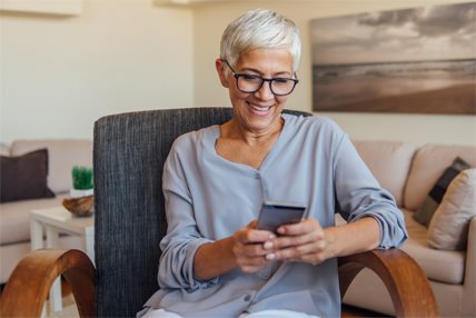 Woman reviewing health apps on her phone