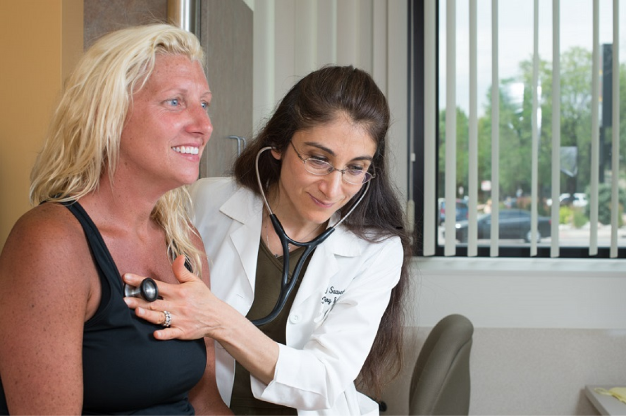 Doctor and patient reviewing patient information