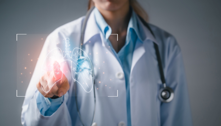 Physician reviewing an image of lungs