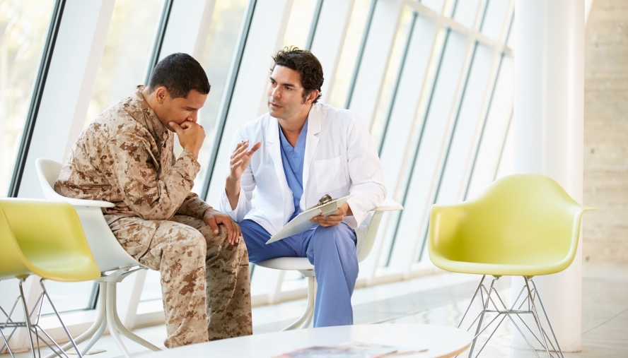 physician consulting military veteran